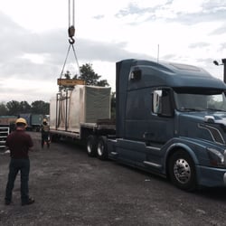 De M Trucking - Transloading a custom paint booth