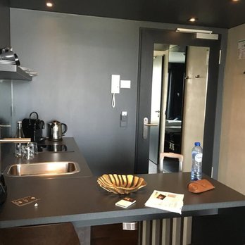 Hotel Zoe - Kitchen area of suite (has two burners/hot plate) with cofee maker, sink, dishes, etc. - Hotels Near Me - Berlin, BE