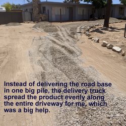 Road base delivery to cover a dirt driveway.