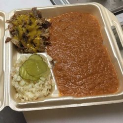 Crossroads BBQ - Chopped BBQ meat with mustard sauce, hash over rice and slaw. Yum!