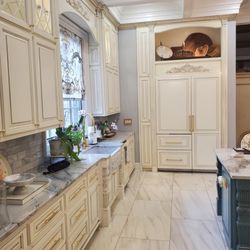 J. Wade Cabinetry - Sub Zero refrigerator and freezer with panels to match cabinet doors.