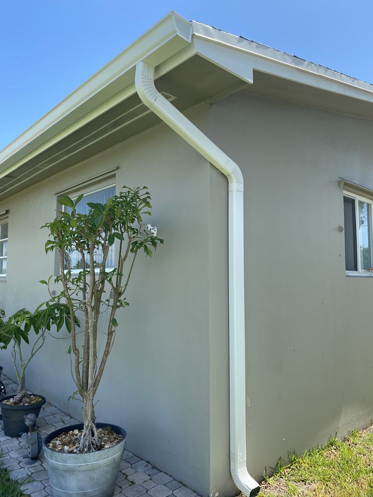 Slide of Del Toro Rain Gutters and Roofing