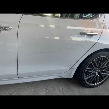OC Express Detailing - Fire retardant stain after going through the drive thru car wash - Auto Detailing Near Me