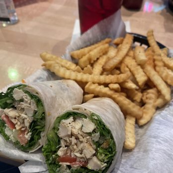 RJ's Pub - Chicken Caesar Wrap with season fries. - Sports Bars Near Me - Rochester Hills, Michigan