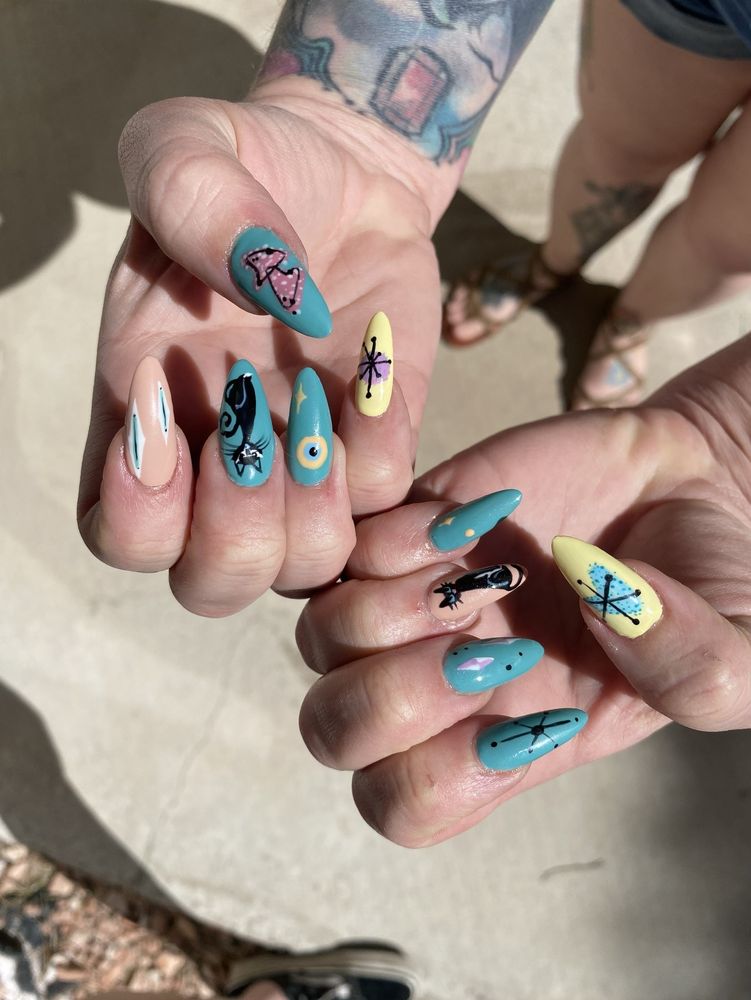 The Nail Shark Logo