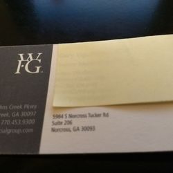 World Financial Group - The business card. Study the logo because he wore this in the form of a lapel pin.
