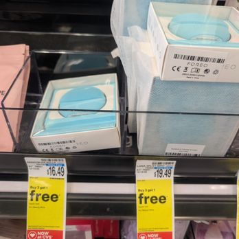 CVS Pharmacy - The image shows two Foreo Luna 4 Play Mint skincare devices in their packaging on CVS pharmacy store shelves. The devices are in small boxes with clear plastic windows, revealing the blue-colored devices inside. Promotional tags below indicate a buy 3 get 1 free offer, with prices of $16.49 and $19.49. The background includes other store items and shelving, typical of retail display areas. - Drugstores Near Me - Ashburn, Virginia