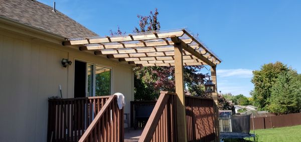 New Pergola Roof Over existing deck. - This was a new pergola build over a deck, including new foundation and anchoring to House. New Pergola Roof Over existing deck. - This was a new pergola build over a deck, including new foundation and anchoring to House.