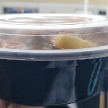 London Doner - a person holding a bowl of food - Halal Near Me - Vaughan, Ontario London Doner - a person holding a bowl of food - Halal Near Me - Vaughan, Ontario