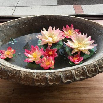 Phattra Thai Restaurant - Window display of lotus in water. - Thai Near Me - Metuchen, New Jersey Phattra Thai Restaurant - Window display of lotus in water. - Thai Near Me - Metuchen, New Jersey