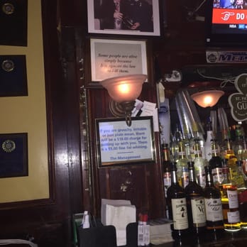 Flannery's Bar - How can you enjoy yourself with this negativity looming over the bar? - Irish Pub Near Me - New York, New York Flannery's Bar - How can you enjoy yourself with this negativity looming over the bar? - Irish Pub Near Me - New York, New York