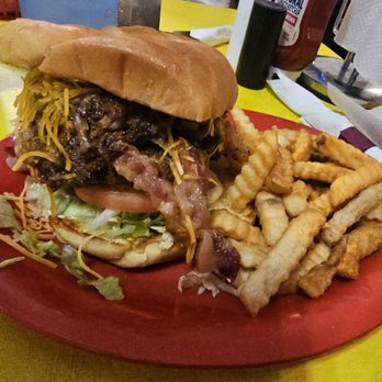 Chubby's Restaurant - The famous burger and fries. Has bacon, pulled pork, hamburger patty and bbq sauce - Southern Near Me - Sevierville, Tennessee Chubby's Restaurant - The famous burger and fries. Has bacon, pulled pork, hamburger patty and bbq sauce - Southern Near Me - Sevierville, Tennessee