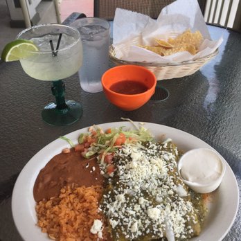 Lobo's Place Mexican - Chicken enchiladas verde, regular margarita on the rocks, and the free chips and salsa (extra yummy-slightly spicy salsa!). - Mexican Near Me - Grafton, Wisconsin Lobo's Place Mexican - Chicken enchiladas verde, regular margarita on the rocks, and the free chips and salsa (extra yummy-slightly spicy salsa!). - Mexican Near Me - Grafton, Wisconsin