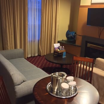 Inn at Port Gardner-Everett Waterfront, Ascend Hotel Collection - Living Room in a King Suite - Inn at Port Gardner - Hotels Near Me - Everett, Washington Inn at Port Gardner-Everett Waterfront, Ascend Hotel Collection - Living Room in a King Suite - Inn at Port Gardner - Hotels Near Me - Everett, Washington