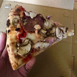 Mushroom, red onion, and ghost pepper salami pizza! Mushroom, red onion, and ghost pepper salami pizza!