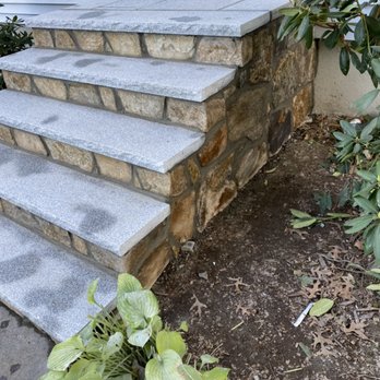 Creative Masonry and Paving - After picture of stairs with new salt and pepper granite cappings and landing area complete with a new veneer facing and sides - Masonry/Concrete Near Me - Natick, Massachusetts Creative Masonry and Paving - After picture of stairs with new salt and pepper granite cappings and landing area complete with a new veneer facing and sides - Masonry/Concrete Near Me - Natick, Massachusetts