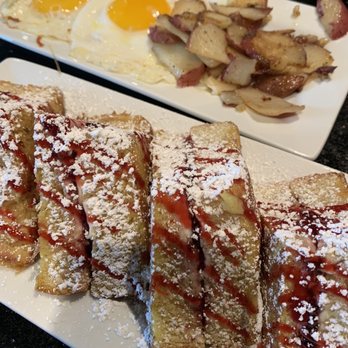 Keke's Breakfast Cafe - stuffed french toast (raspberry & cream cheese )  sunny side eggs  homestyle potatoes - Breakfast & Brunch Near Me - Bradenton, Florida