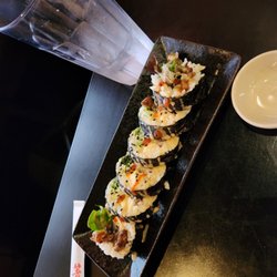 Simply Asia - Lonestar roll. Taste like a big Mac rolled up in a sushi roll. Lol it was good