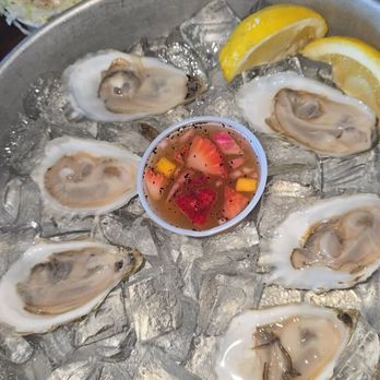 Bunky's Raw Bar & Grill - Bunky's Fresh Shucked Oysters with Strawberry Mango Mignonette (Valentines Day Menu) - Sports Bars Near Me - Indialantic, Florida Bunky's Raw Bar & Grill - Bunky's Fresh Shucked Oysters with Strawberry Mango Mignonette (Valentines Day Menu) - Sports Bars Near Me - Indialantic, Florida