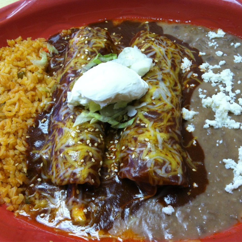 El Tomate Restaurant - Enchilada mole w/ ad $5.99/reg $9.99 - Mexican Near Me - San Francisco, California El Tomate Restaurant - Enchilada mole w/ ad $5.99/reg $9.99 - Mexican Near Me - San Francisco, California