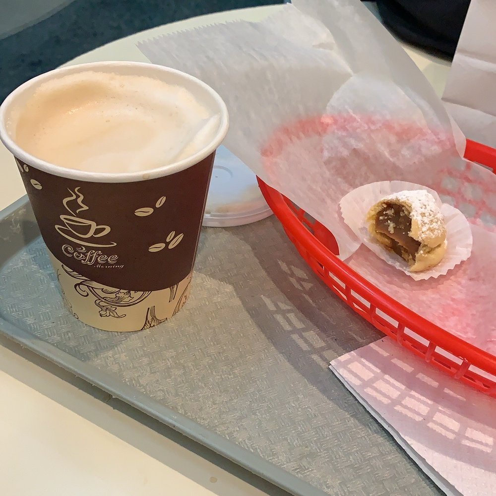 Rio De La Plata Bakery Shop - Small coffee and an Argentine treat filled with dulce de leche carmel. - Bakeries Near Me - Elmhurst, New York