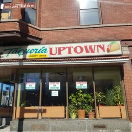Exterior outside entrance of Taqueria Uptown - Chicago, Illinois Exterior outside entrance of Taqueria Uptown - Chicago, Illinois