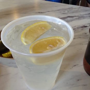 Killen's Barbecue - A short glass of ice cold water with some lemons. - Barbeque Near Me - Pearland, Texas