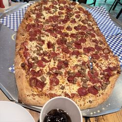 Gridiron Pizza - Biggest pepperoni and sausage pizza