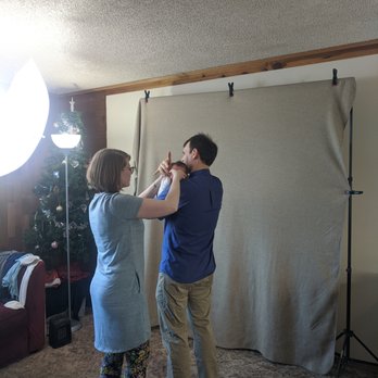Feasible Photography - Helping position baby for the perfect pose. - Session Photography Near Me Feasible Photography - Helping position baby for the perfect pose. - Session Photography Near Me
