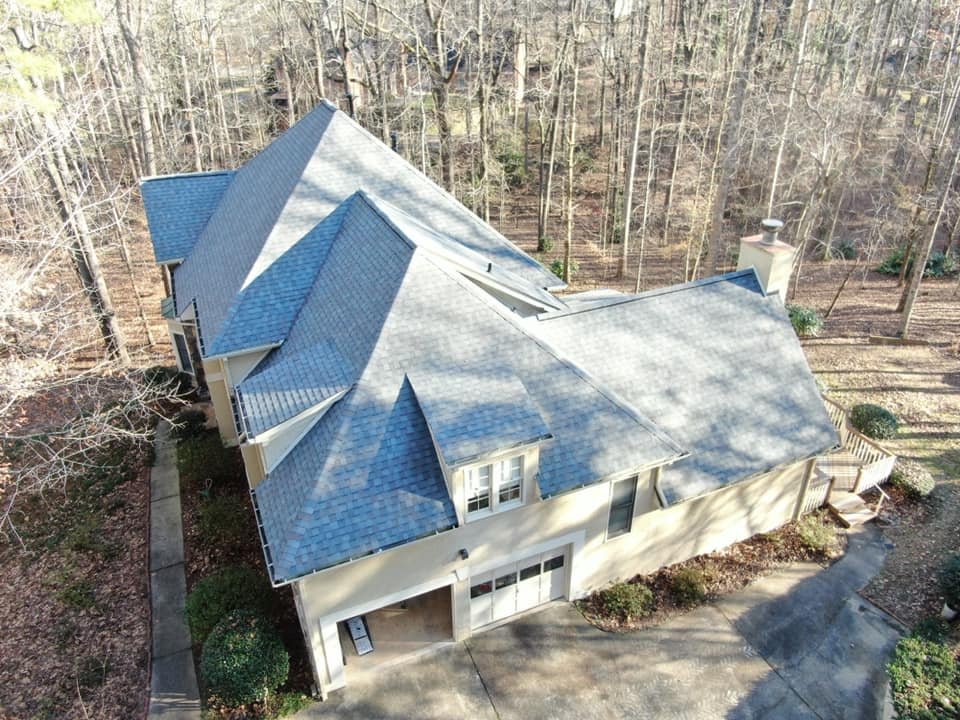 Slide of AMI Roofing