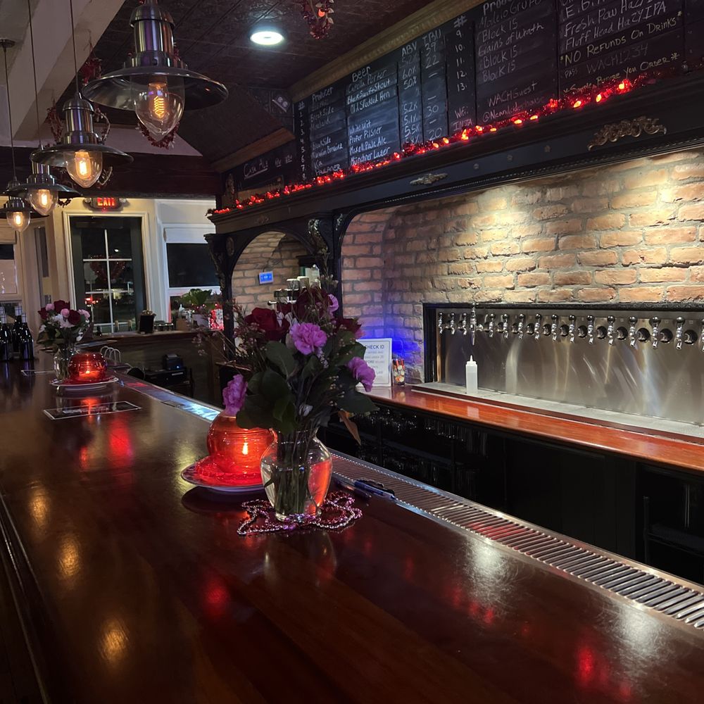 a bar with flowers on the bar a bar with flowers on the bar