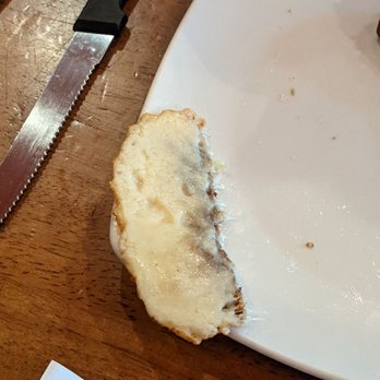 SPIN! Pizza - Lump of cheese that was on the side of the grilled cheese. (Burnt on the opposite side) - Pizza Near Me - Olathe, Kansas SPIN! Pizza - Lump of cheese that was on the side of the grilled cheese. (Burnt on the opposite side) - Pizza Near Me - Olathe, Kansas