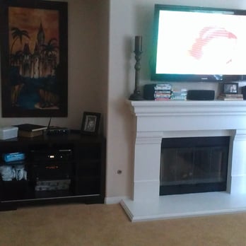 Xtreme AV - Another satisfied customer. LCD TV mounted above fireplace with full 5.1 surround sound. All wiring has been concealed. - Home Theatre Installation Near Me Xtreme AV - Another satisfied customer. LCD TV mounted above fireplace with full 5.1 surround sound. All wiring has been concealed. - Home Theatre Installation Near Me