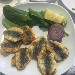 Sardalyos - Split, cleaned and fried sardines.