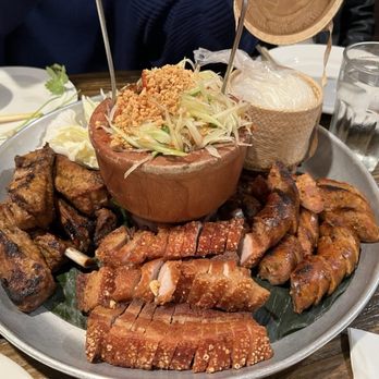 Bhan Mae Vane - BMV ULTIMATE PAPAYA PLATTER - $70 - Crispy Porky Belly, Lao Sausage, and BBQ Prok Ribs as the 3 meat choices. - Thai Near Me - Alameda, California