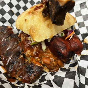 Bone Appetit Bar-b-que grill - ows a barbecue sandwich - Barbeque Near Me - Sparks, Nevada