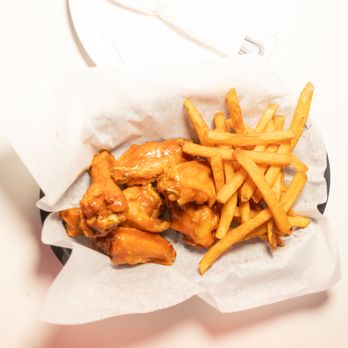 Champion Kitchen - Wings at Champion Kitchen - Sports Bars Near Me - Washington, DC, District of Columbia
