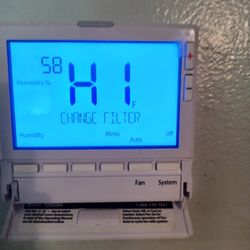 American AC & Heating - This is our thermostat.  After it got to 98 degrees it switched to show temperature as HI
