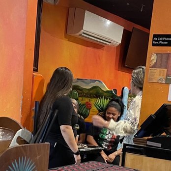 La Tolteca - Bartenders. Servers . Possibly a manager sitting at booth eating chick fil a - Mexican Near Me - Cockeysville, Maryland