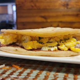 Baleda - With eggs, avocados, beans, sour cream and cheese Baleda - With eggs, avocados, beans, sour cream and cheese