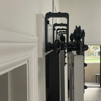Precision Fit Doors and Windows - One panel shaker wood bypass barn door. Double barn door track. - Windows Installation Near Me - Phoenix, Arizona Precision Fit Doors and Windows - One panel shaker wood bypass barn door. Double barn door track. - Windows Installation Near Me - Phoenix, Arizona