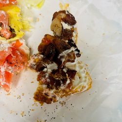 Pop's Neighborhood Grill - The overcooked 3 strips of bacon on the Pop's Bacon BLT with the less than hunk of bacon