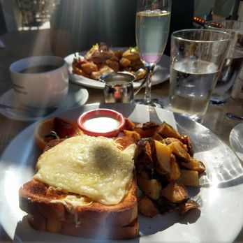 Cafe Jolie - Croque Madame. So good! Very rich. Crab cake Benedict in the background - Breakfast & Brunch Near Me - Alameda, California Cafe Jolie - Croque Madame. So good! Very rich. Crab cake Benedict in the background - Breakfast & Brunch Near Me - Alameda, California