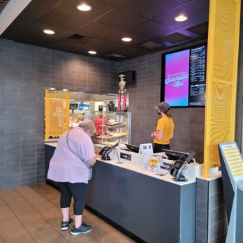 McDonald's - a woman ordering food at the counter - Fast Food Near Me - Hartville, Ohio