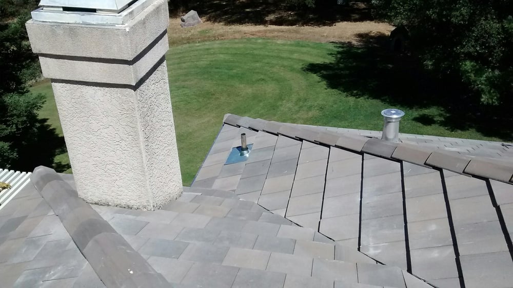 Slide of Mountain Roofing Systems