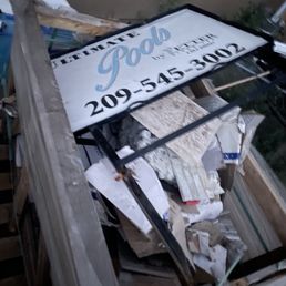 This company sign belongs in the garbage just like the quality of work they accept from the subs contractors they use This company sign belongs in the garbage just like the quality of work they accept from the subs contractors they use