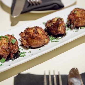 The Well - Bacalao Croquetas $12.00 (with squid ink aioli) - Bars Near Me - Oakland, California The Well - Bacalao Croquetas $12.00 (with squid ink aioli) - Bars Near Me - Oakland, California