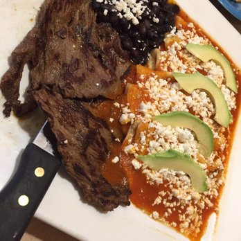 Fonda La Taquiza - Asada enchiladas (filling outside of shell) average, might be homemade corn tortillas though. - Latin American Near Me - Charlotte, North Carolina Fonda La Taquiza - Asada enchiladas (filling outside of shell) average, might be homemade corn tortillas though. - Latin American Near Me - Charlotte, North Carolina
