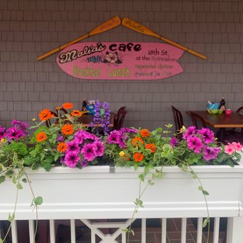 Malia's Cafe - Signage & patio seating - Breakfast & Brunch Near Me - Ocean City, Maryland Malia's Cafe - Signage & patio seating - Breakfast & Brunch Near Me - Ocean City, Maryland