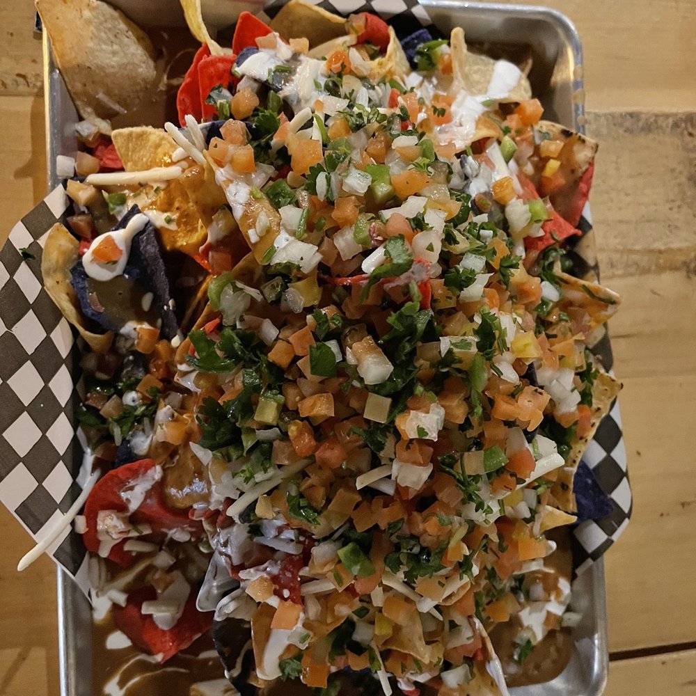 Mexhico - Top view of large nachos - Mexican Near Me - Barrie, Ontario Mexhico - Top view of large nachos - Mexican Near Me - Barrie, Ontario